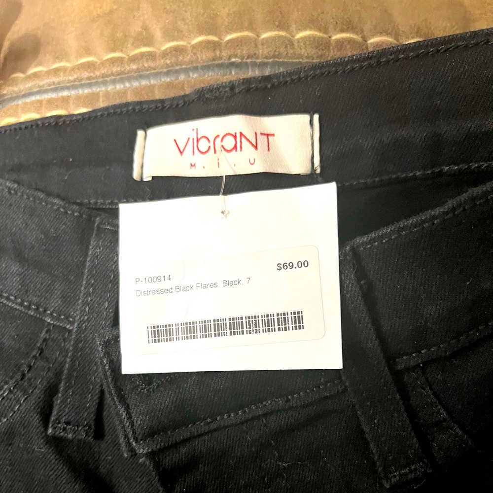 New & classic Bell Bottoms- tag and size displayed.